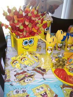 the table is set up with spongebob themed food