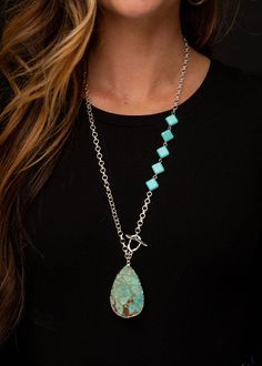 Add a touch of Southwestern elegance to your look with the Turquoise Stone Pendant Silver Chain Necklace. This 8-inch silver chain necklace features a striking turquoise stone pendant, complemented by turquoise diamond accents. The vibrant turquoise stones contrast beautifully with the sleek silver chain, creating a sophisticated and eye-catching design. Perfect for adding a pop of color and a touch of refinement to any outfit, this necklace is versatile enough for both everyday wear and special Cheap Turquoise Necklaces With Natural Stones, Cheap Elegant Turquoise Necklace, Luxury Single Strand Turquoise Necklace, Luxury Single Strand Turquoise Necklace For Women, Cheap Turquoise Sterling Silver Necklaces, Luxury Single Strand Round Turquoise Necklace, Affordable Statement Turquoise Necklace Gift, Luxury Silver Necklace With Turquoise Stones, Luxury Single Strand Turquoise Necklace As Gift