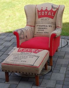 a chair and ottoman made out of burlock with red cushion on brick patio