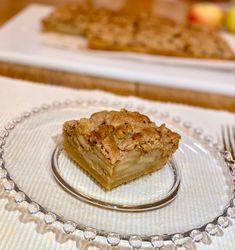 a piece of pie sitting on top of a glass plate