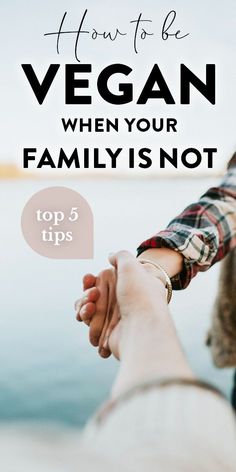 two people holding hands with the text how to be vegan when your family is not top 5 tips