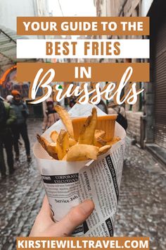 a person holding up a basket with fries in it and text overlay that reads where to find the best fries in brussels