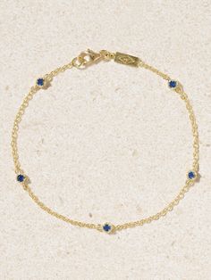 Jennifer Meyer's bracelet is dotted with five deep blue sapphires in distinct illusion settings that accentuate the beautiful properties of each stone. It's handmade from 18-karat gold and has a dainty chain ensuring it looks just as elegant on its own or part of a colorful stack. Safire Jewelry, Beautiful Properties, The Bling Ring, Jennifer Meyer, Dainty Chain, Sapphire Bracelet, Fine Jewelry Bracelets, Dainty Bracelets, Bling Rings