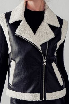 Add a touch of edgy sophistication to your wardrobe with this Sleeveless Collared Zip-Up Faux Leather Vest, designed for both style and warmth. Key features include:Faux Leather Exterior: Sleek and stylish, the faux leather adds a modern, rugged touch to any outfit.Cozy Sherpa Lining: Stay warm and comfortable with the soft sherpa lining, perfect for cooler days.Collared Design: The structured collar enhances the vest’s bold look, adding a polished finish.Functional Slant Side Pockets: Practical Faux Leather Vest, Leather Vest, Jack Black, Mens Skin Care, Sherpa Lined, Mens Fragrance, Women Fragrance, Men's Grooming, Holiday Fashion