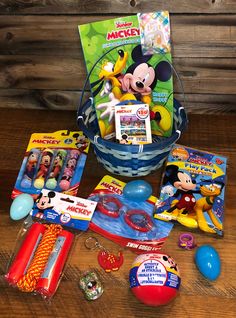 The work is done for you!   This cute blue basket is stuffed full of Mickey Mouse and perfect for Easter! It even comes wrapped & ready to gift!  The coloring book will be outside of the basket for shipping purposes.  Add on a personalized message and or candy at checkout.  - 154 Blue Easter Basket, Boys Easter Basket, Blue Basket, Affordable Christmas Gifts, Easter Basket Items, Blue Baskets, Easter Girl, Activity Sheets, Jump Rope