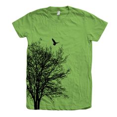 Tree Shirt, Womens Junior Tshirt, Tree Tshirt, Neck, Cotton T-shirt, Bird Shirt, Short Sleeve, Gift for Women, Nature Shirt, Camping Shirt Hand pressed in California by Couth. Printed on Fine Jersey Short Sleeve T Fine Jersey (100% Cotton) construction (Heather Grey contains 10% Polyester). How to order: Sizing: Before ordering PLEASE CHECK our size/color chart (last picture of the listing) for measurements, they run a little smaller than other brands so we recommend to size up if you are in between sizes. THEY HAVE A JUNIOR FIT. A WOMEN'S XL IS ABOUT AN UNISEX SMALL. Please Select your T-shirt's size and color at checkout from the drop down menu on the right and please check the measurements from our size chart (last picture of the listing) Available sizes: S, M, L, XL, 2XL New to Etsy? o Green Cotton Tops With Graphic Design, Green Crew Neck T-shirt With Graphic Design, Green Cotton T-shirt With Screen Print, Green Graphic Design Crew Neck Shirt, Green Crew Neck Shirt With Graphic Design, Green Graphic Design Short Sleeve T-shirt, Green Short Sleeve Shirt With Graphic Design, Tree Tshirt, Tree Costume