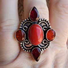 Brand New Handmade Coral And Garnet Silver Ring. 925 Stamped Wear Your Narrative: Jewelry With A Unique Journey. New To Poshmark? Use Referral Code Kimberlyn222 To Receive $10. Nickel-free Red Rings, Red Coral Ring Design Women, Elegant Coral Sterling Silver Jewelry, Bohemian Coral Dangle Jewelry, Red Coral Ring, Hand-strung Round Red Coral Jewelry, Denim Skirt Women, Skirt Women, 925 Silver Ring