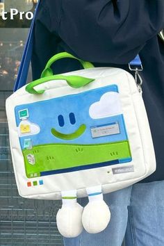 Windows XP Aesthetic Handbag - the cutest tech-inspired accessory ! This  bag features a smiling Windows XP character with adorable little legs

The bag's screen displays the iconic and cult-favorite Bliss wallpaper, taking you back to the days of serene green hills and clear blue skies 🌄☀️
On the bag's 'desktop,' you'll discover embroidered icons like the Recycle Bin, a folder, and even a Notepad application. Plus, there's a sweet dialog box that greets you with 'Hi baby, be happy, Ok? Windows Xp Aesthetic, Weird Bags, Bliss Wallpaper, Chicago Outfit, Recycle Bin, Ninth Grade, Pin Man, Tech Bag, Aesthetic Stores