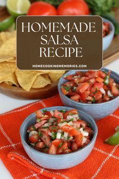 two bowls filled with salsa and tortilla chips on top of a red towel