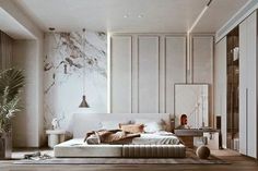 a bedroom with marble walls and flooring is pictured in this image, the bed has pillows on it