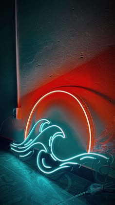 a neon sign that is on the side of a wall