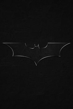 the dark knight rises logo on a black background