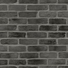 a black and white photo of a brick wall that has been made into a pattern