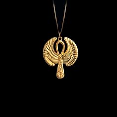 This solid gold key of Ankh necklace showcases exquisite craftsmanship, symbolizing life and spirituality. The key of Ankh pendant is more than just jewelry; it's a fine representation of ancient Egyptian elegance and the timeless allure of this sacred symbol. PENDANT INFORMATIONThis pendant is made of real, solid gold.• Made in USA• Material: 14k or 18k solid gold• Finish: polished• Height: 1.25" (31,5 mm) x Width: 1" (26,5 mm)• Pendant weight: approx. 6 grams (14k)• Bail: fits up to 4 mm chain Symbolic Ankh Ceremonial Jewelry, Amulet Style Ankh Necklace In Brass, Gold Ankh Necklace For Ceremonial Occasions, Symbolic Ankh Brass Necklace, Ceremonial Ankh Amulet Necklace, Gold Brass Ankh Jewelry, Luxury Gold Ankh Jewelry, Gold Ankh Brass Jewelry, Spiritual Ankh Necklace In Yellow Gold