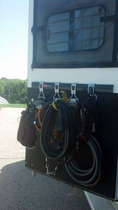 there are many cords attached to the back of a truck's door and window