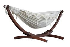 a white hammock with wooden stand