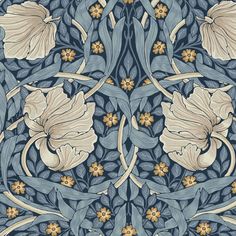 an intricately designed wallpaper with flowers and leaves in blue, yellow and white