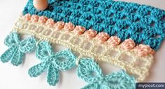 a crocheted table runner is shown on a white surface