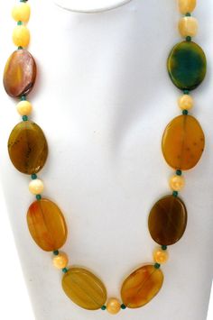 Statement Gemstone Jewelry - This is a substantial green & yellow agate and yellow quartz bead necklace. It is hallmarked 925, has sterling silver clasp and extension, chain, widest bead is 1.25" wide. It is 30" long, which includes the 2" extension, so it can be worn from 28" to 30" in length. Weight is 189 grams.