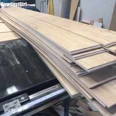 several pieces of plywood sitting on top of a table