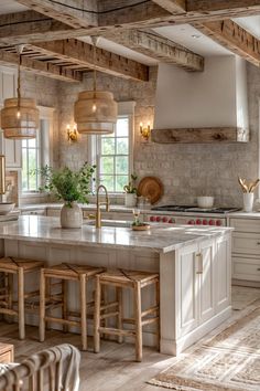 a kitchen with an island and stools in it