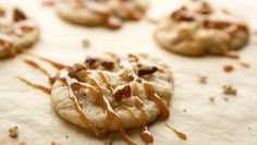 several cookies with caramel drizzle on them