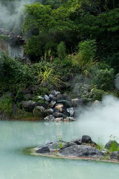 the water is blue with steam coming from it