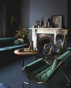 a living room filled with furniture and a fire place