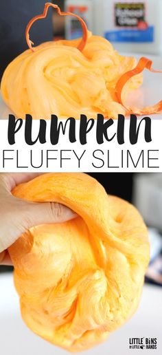 the pumpkin fluffy slime is being held up by someone's hand