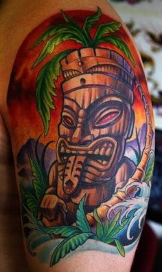 an image of a tiki tattoo on someone's arm