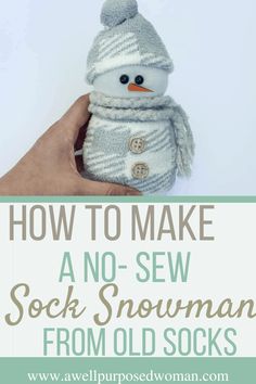 a hand holding a small snowman doll with text overlay reading how to make a no - sew sock snowman from old socks