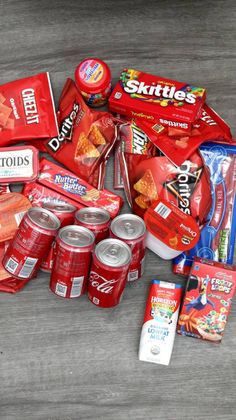 a pile of snacks sitting on top of a wooden table