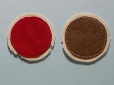 two pieces of felt sitting next to each other