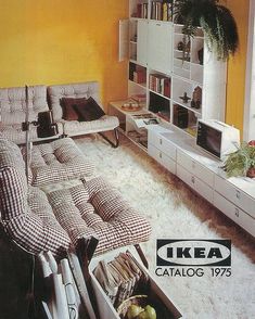 an advertisement for ikea catalog showing the living room with furniture and bookshelves