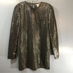 Silver Sparkle Dress By H & M. It Is New With Tags. Size Is 12 And Measures Pit To Pit 20 Inches And Length Is 33 Inches. New Condition. Metallic Long Sleeve Mini Dress For Fall, Gold Long Sleeve Mini Dress For Fall, Metallic Mini Dress For Fall, Gold Long Sleeve Mini Dress For Holiday Party, Metallic Long Sleeve Mini Dress For Cocktail, Metallic Fitted Long Sleeve Dress, Metallic Fitted Mini Dress With Long Sleeves, Fitted Metallic Long Sleeve Dress, Metallic Long Sleeve Mini Dress For Spring