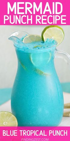 a blue tropical punch with limes in it and the text mermaid punch recipe on top