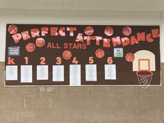 a bulletin board with basketballs on it in a school gym area that says perfect attendance all stars