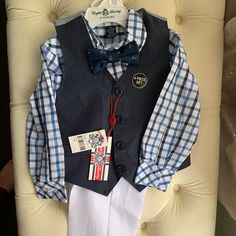 English Laundry 4 Piece Boys Suit. Size 2t. Includes Navy Vest, White Pants, White And Blue Button-Down Shirt And Navy Bowtie With An Anchor Pattern. Brand New With Tags. Navy Vest, Anchor Pattern, Kids English, Boys Suits, White Pants, Matching Sets, Button Down Shirt, Blue Color, Blue And White