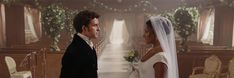 the bride and groom are standing in front of each other at their wedding day ceremony