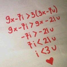 the numbers are written in red ink on a piece of paper that has hearts drawn on it