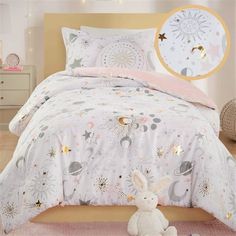 Get ready for adorable and enchanting dreams with the Mi Zone Kids Celia Starry Sky Metallic Printed Comforter Set. The comforter is a girl's dream, with gold metallic stars and moons that sparkle on the soft fabric, creating a magical look. The set includes two matching shams (one in Twin/Twin XL) that have the same starry pattern, and a cute round decorative pillow with embroidered details. So cozy and cute! Items in the set may come in a rolled or compressed packaging, which will need to be fluffed up or steam ironed before use to remove wrinkles. Color: Pink. Space Comforter, Girls Comforter Sets, Round Decorative Pillows, Girl Comforters, Full Comforter Sets, Queen Size Comforter Sets, Space Themed Bedroom, Star Wars Room, Stars And Moons