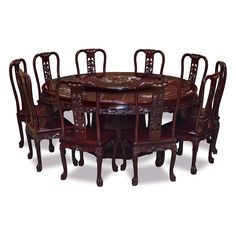 a round dining table with eight chairs around it, all in dark brown wood finish