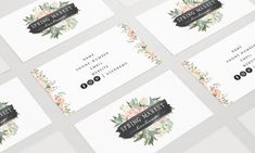 six business cards with floral designs on them