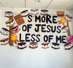 there is a sign that says s'more of jesus less of me on the wall