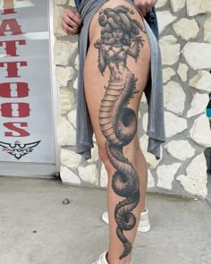 a person with a tattoo on their leg