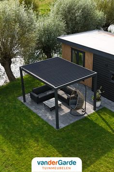 an overhead view of a backyard with a patio and lounge area in the middle of it