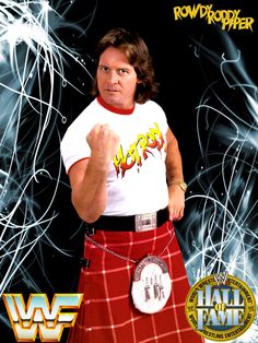 a man in a kilt with his fist up and the words wwf on it