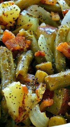 a close up view of cooked vegetables with seasoning