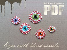 four beaded eyeballs on a table with the text, free pattern and instructions