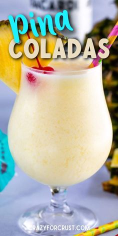 a pineapple drink in a glass with the words pina coladas